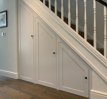 shaker style under stairs storage